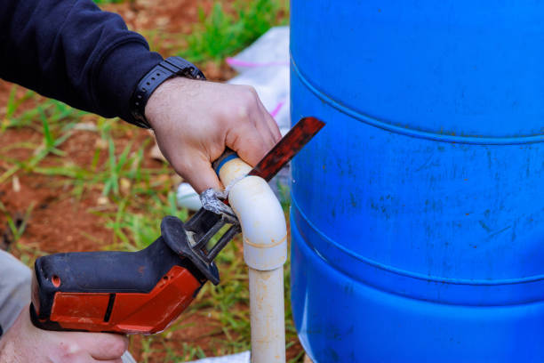 istock Repair a maintenance water supply well system pump for private house 2159023094