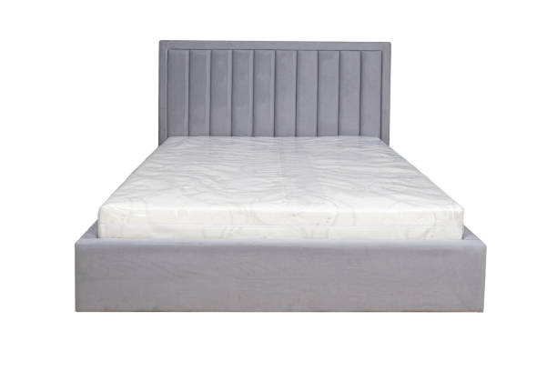 Double bed with soft headboard. Cushioned furniture.