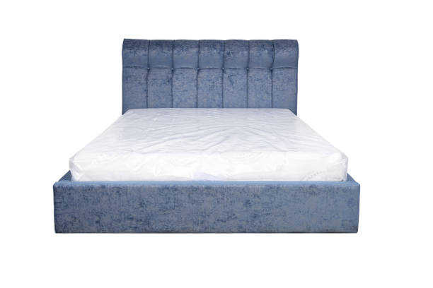 istock Double bed with soft headboard. Cushioned furniture. 2159028553