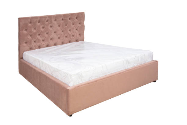 istock Double bed with soft headboard. Cushioned furniture. 2159028655