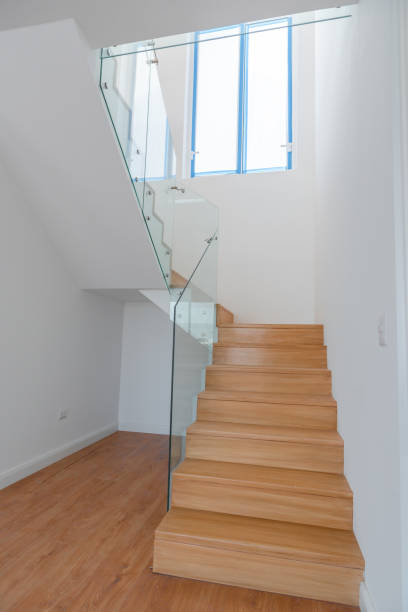 istock Duplex apartment staircase with wood finishes 2159032943