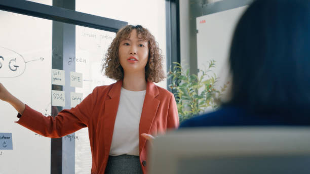 istock Female Professional Presenting ESG Strategy Leadership and Innovation 2159048988