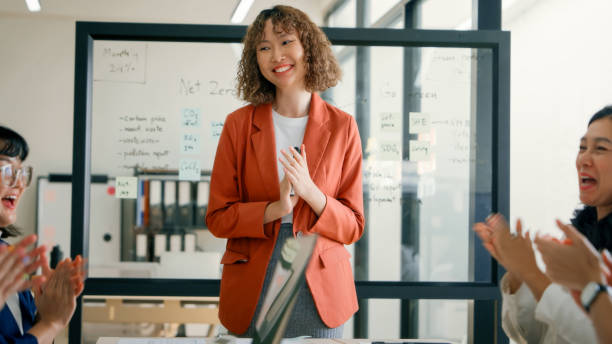 istock Businesswoman Project manager Clapping During ESG Presentation Leadership Team Collaboration 2159049029