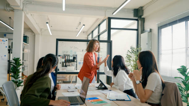 istock Businesswoman Project manager Clapping During ESG Presentation Leadership Team Collaboration 2159049051