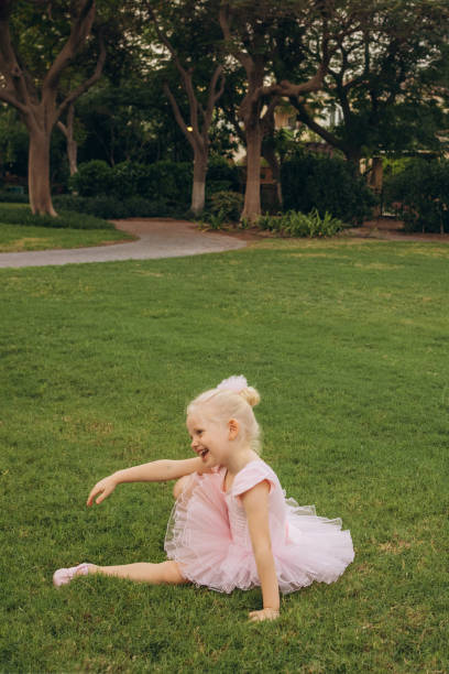 istock Joyful Ballerina Playing on the Lawn 2159051237