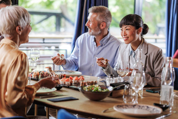 istock Photo of cheerful diners in restaurant 2159052018