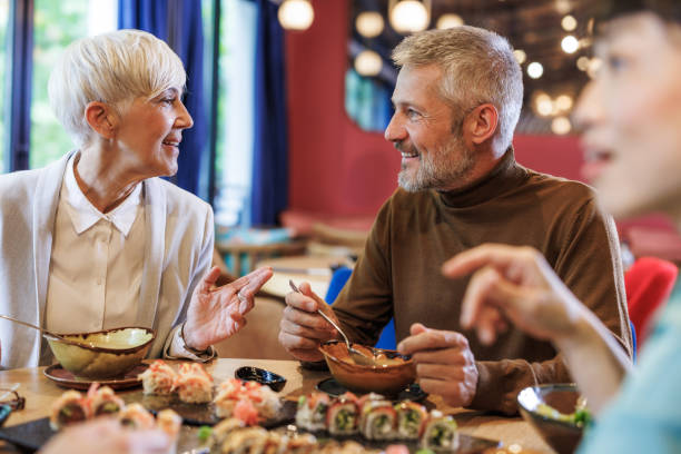 istock Group of friends enjoying in a restaurant 2159052029