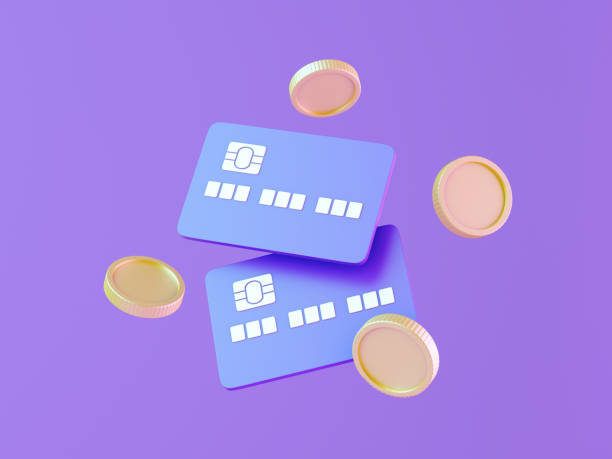 istock Credit Cards and Coins on Purple Background 2159052075