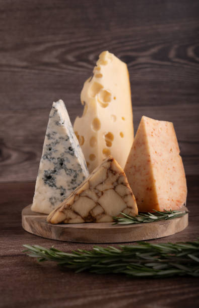 istock photography, cheese board, assorted, group, cheese, different, various, snack, food, wine, plate, piece, board, color image, meal, wooden, product, assortment 2159053525