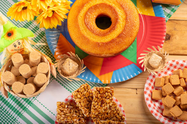 istock Festa Junina, beautiful rustic table with dishes containing various types of sweets for Festa Junina in Brazil, top view. 2159059132
