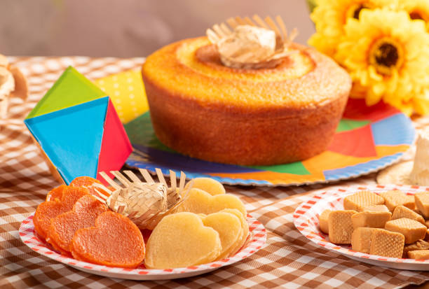 istock Festa Junina, beautiful rustic table with dishes containing various types of sweets for Festa Junina in Brazil, selective focus. 2159059325