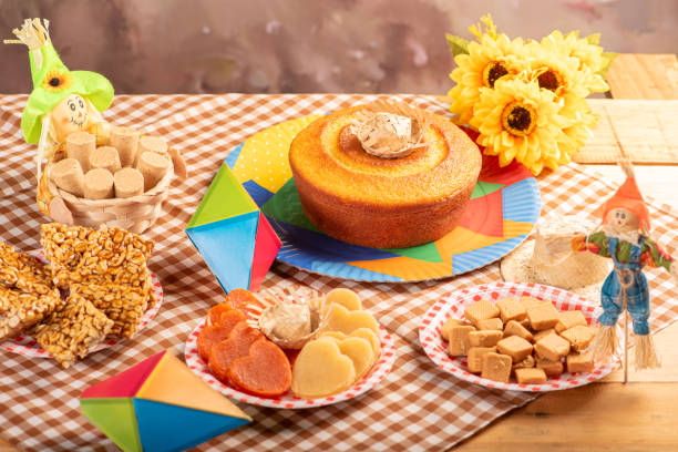 istock Festa Junina, beautiful rustic table with dishes containing various types of sweets for Festa Junina in Brazil, selective focus. 2159059327