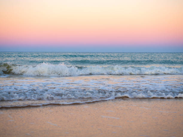 istock Horizon from the beach at sunrise 2159061118