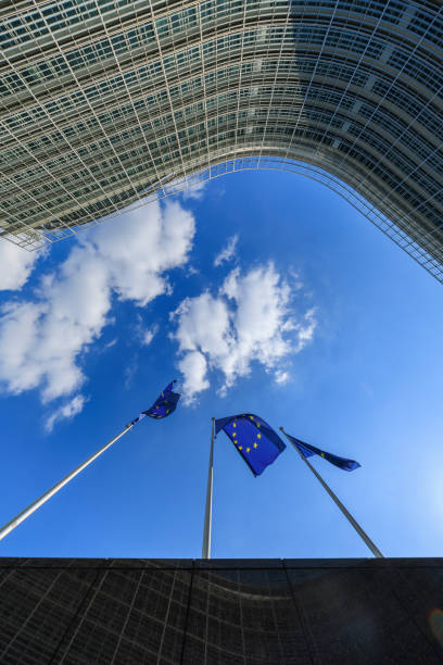 European flags in front of the Berlaymont building, headquarters of the European Commission
