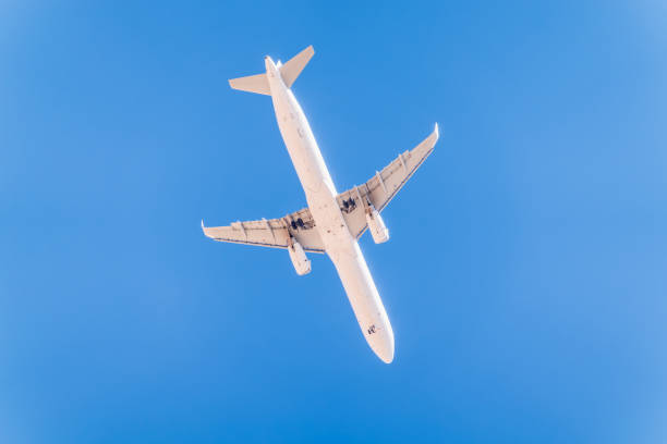 istock Airplane before landing in blue sky, Airbus A321-200 2159067880