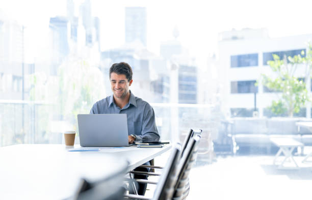 Businessman working on a laptop computer in the office