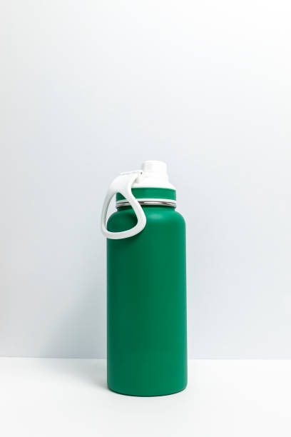 istock Mockup Reusable Sport Green Water Bottle, Protein Shaker On White Gray Background. Copy Space For Text. Tumbler, Product Template. Vertical Plane. 2159070388