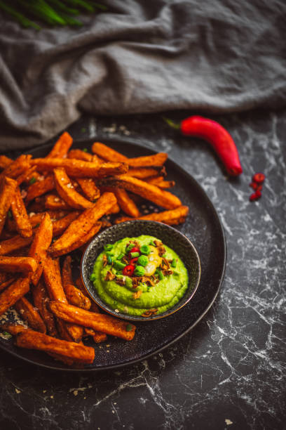 istock Sweet Potato Fries with Pea Guacamole 2159074865
