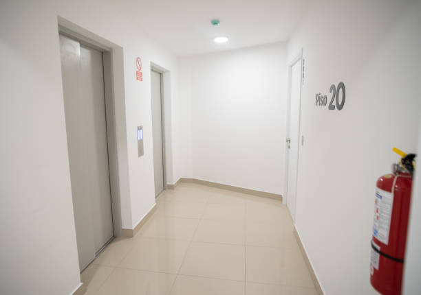 istock lobby entrance of apartment with elevator 2159075684
