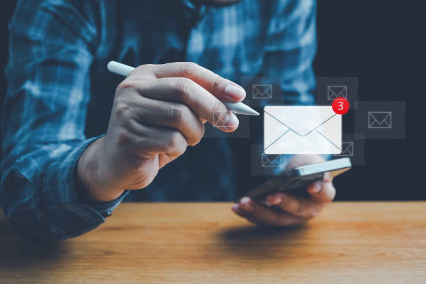 istock Email marketing concept, Human touch on email and surfing the internet with email icon, email icon, e-mail communication, e-mail marketing concept, send e-mail or news letter, online working internet. 2159075783