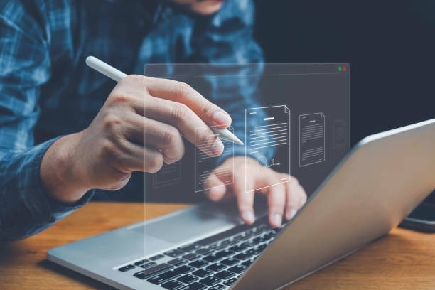 istock Checklist, Digital and smart checklist document concept, Businessman marking on e-checklist on virtual screen and use laptop document management with modern intelligent online systems high security. 2159075784