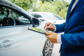 businessman-in-suit-and-car-auto-insurance-agent-assess-car-damage-discussing-deductible.jpg?b=1&s=170x170&k=20&c=S2InTwjJ5t_Yq0jwOTDpW0MdpyANAqmDlzyR_SudImg=