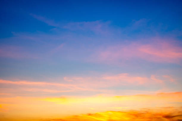 istock Beautiful , luxury soft gradient orange gold clouds and sunlight on the blue sky perfect for the background, take in everning,Twilight, Large size, high definition landscape photo 2159077677
