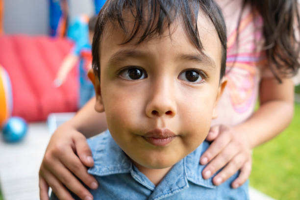 istock Child nervous to meet another child 2159079295