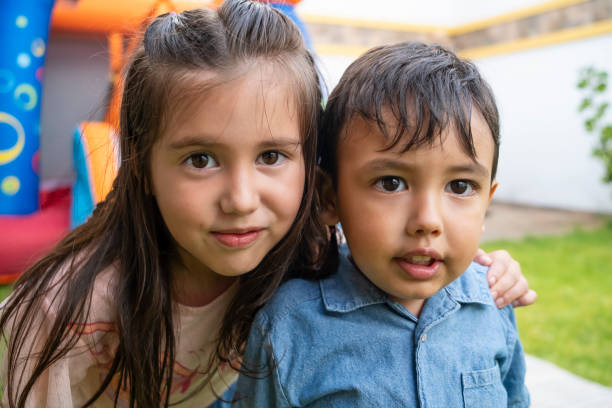 Portrait of happy siblings