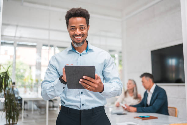 istock Mid Adult Black Businessman with Tablet 2159083744