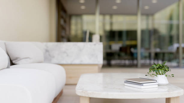 istock A white marble coffee table in a modern office lounge or waiting room. 2159097529
