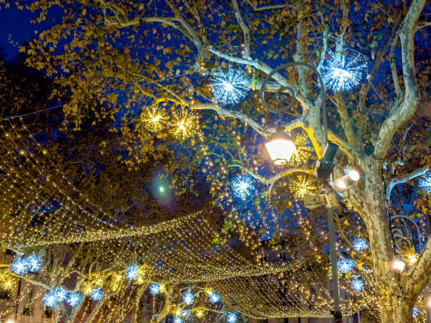 istock Shiny decorated Christmas market at night 2159099737
