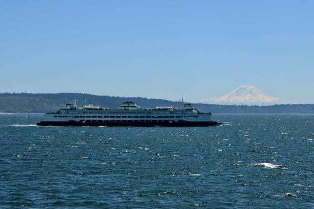 A Washington State ferry and Mt. Rainier from Puget Sound