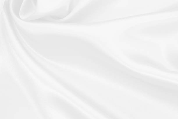 istock White fabric texture background, detail of silk or linen pattern. 2159112962