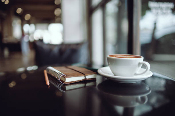 istock coffee drink with book on desk 2159113896