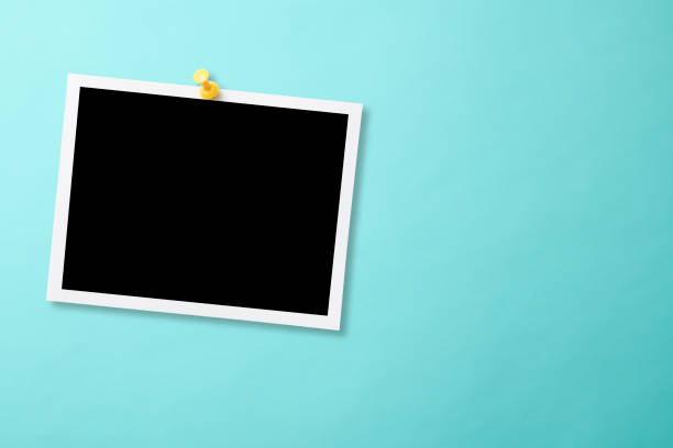 istock Pinned blank photo with thumbtack on light blue background 2159120760