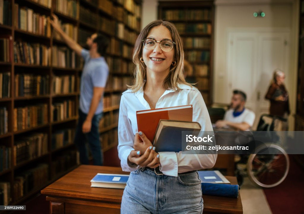 School Library Stock Young Students Study And Learn In The School Library Stock Photo ...