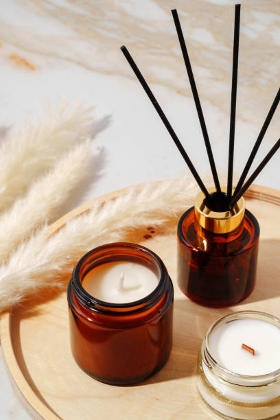 istock Scented Candles and Reed Diffuser on a Wooden Tray 2159122592