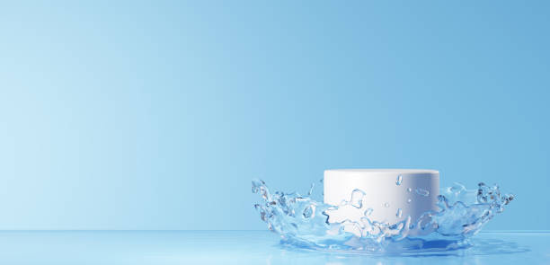 istock 3D Illustration.White pedestal floating on blue background and water surface. Splash of water.Copy space. (Horizontal) 2159123751