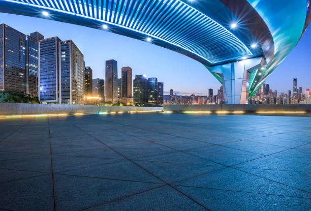 istock Empty square floor and bridge with modern city buildings scenery at night 2159123846