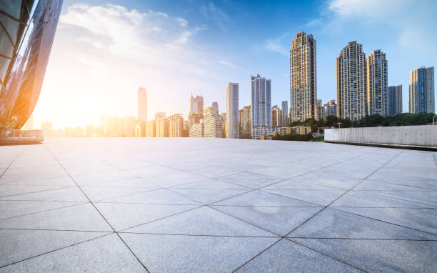 istock Empty square floors with modern city buildings scenery at sunrise 2159123867