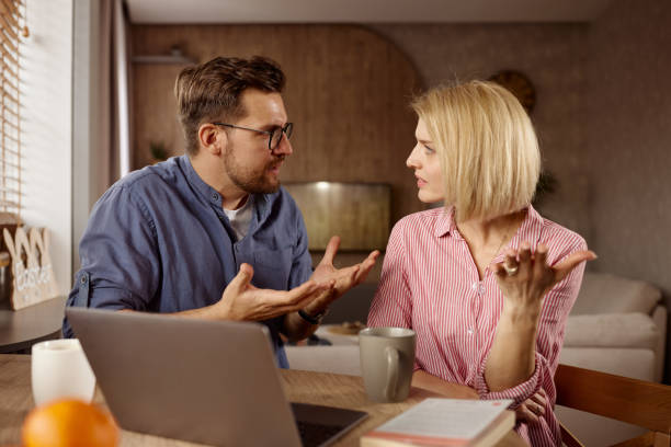 istock Frustrated couple arguing at home. 2159124030