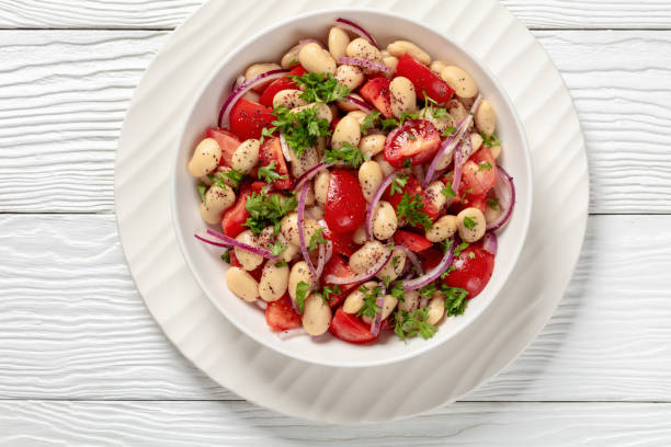 istock Piyaz, Turkish white bean salad in a bowl 2159124319
