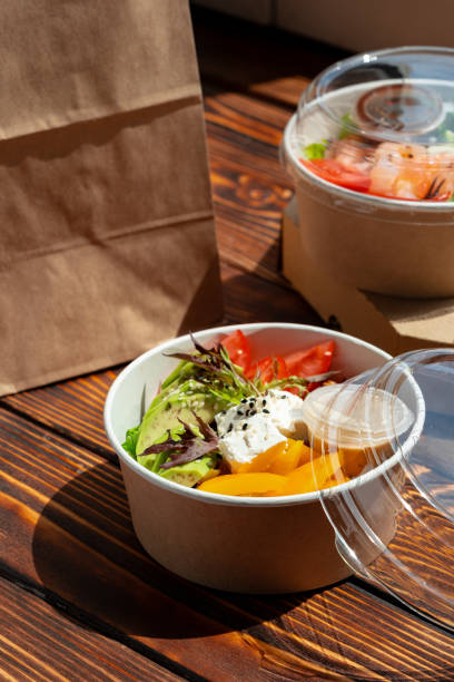 istock Take out poke bowl on wooden background 2159125700