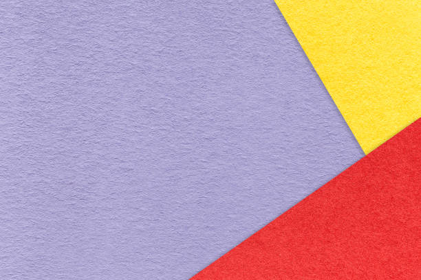 istock Texture craft light violet paper background with red and yellow border. Vintage abstract purple cardboard. 2159125704