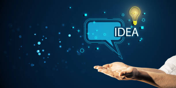 istock A digital graphic of a hand and a lightbulb inside a speech bubble with the word IDEA against a blue background, symbolizing concept and creativity 2159126794