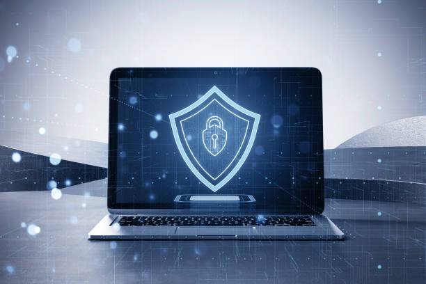 istock Laptop with digital holographic shield on abstract background, concept of cybersecurity. 3D Rendering 2159126856
