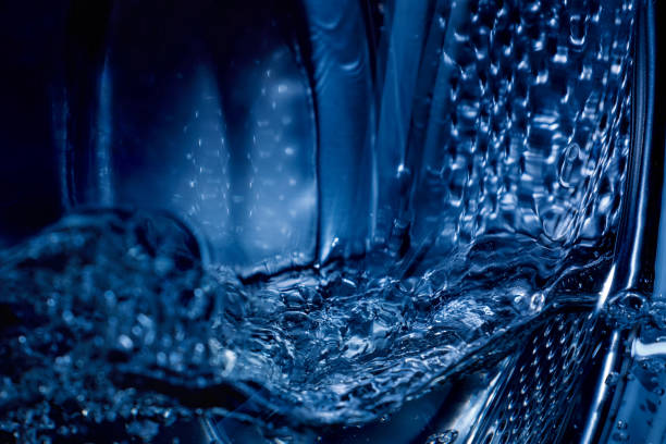 istock Close-up of a washing machine drum with water. 2159131165