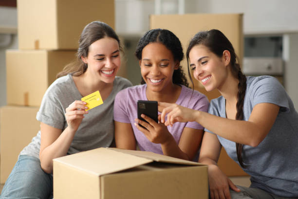 istock Three roommates buying online while moving house 2159131967