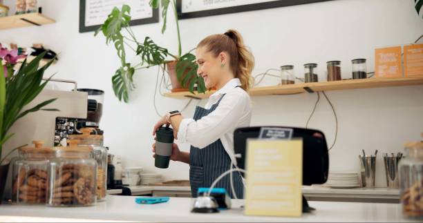istock Service, barista or customer with coffee shop or store for drinks or return at checkout counter in a cafe job. Reusable bottle, giving or waitress in small business restaurant with a woman or lady 2159132076